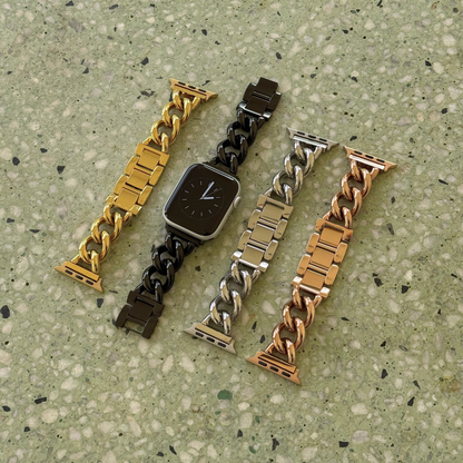 Gold, black, silver and rose gold chain link Apple Watch bands laid out on terrazzo. Bold waterproof stainless steel iWatch straps, compatible with Apple Watch 38mm to 49mm, Series 1-11, SE and Ultra