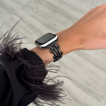Black chain link Apple Watch band worn with a feather trimmed cuff. Sleek metal iWatch bracelet for the clean girl aesthetic, compatible with Apple Watch 38mm to 49mm, Series 1-11, SE and Ultra