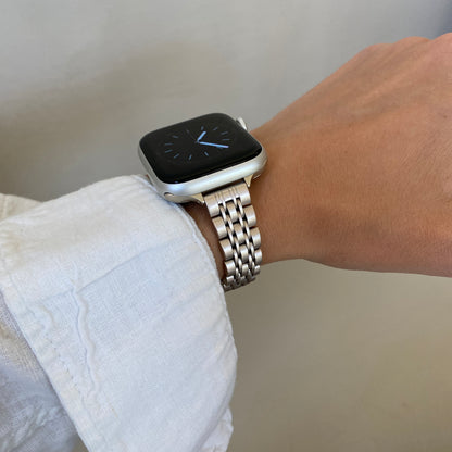 Starlight woven link Apple Watch band worn with a white linen cuff, stainless steel strap for Apple Watch 38mm, 40mm, 41mm, 42mm, 44mm, 45mm and 49mm